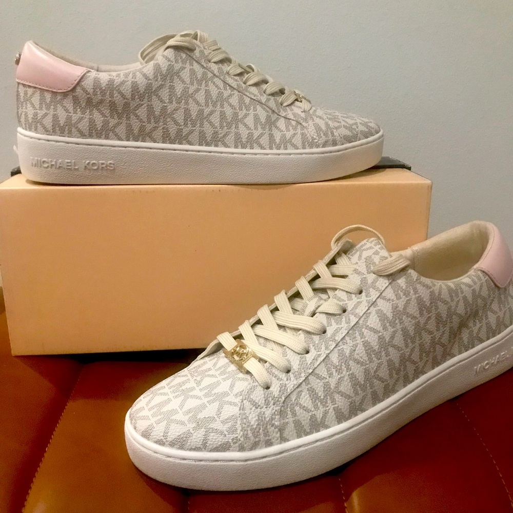 Micheal Kors  Ladies sneakers size  7.5 colors are tan, white and blush .